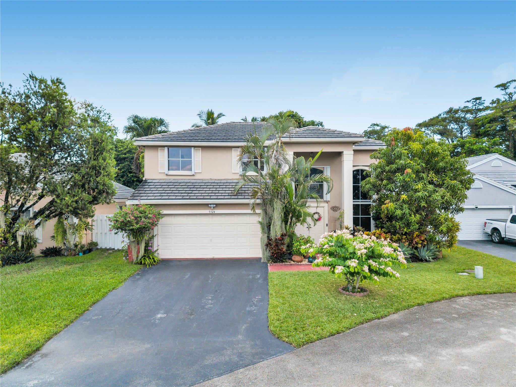 Located in the sought-after Somerset at Laurens Turn in Winston Park, this beautifully maintained 3-bed, 2.5-bath, loft (can be easily converted to a 4th bedroom) & 2 car garage home offers the perfect mix of tranquility, elegance, and convenience! Enjoy soaring volume ceilings, formal and secondary living rooms perfect for hosting, a first floor main bedroom for added privacy, updated kitchen featuring custom cabinets, granite countertops, newer stainless steel appliances. Newer AC (2023). Outside is a backyard sanctuary; A variety of mature fruit trees— 6 mango trees, lychee, avocado, jackfruit (2), calamondin, moringa (3), and more—offering shade, beauty, and fresh harvests. The tranquil canal behind the property enhances the sense of seclusion and natural beauty, Must see! LOW HOA!