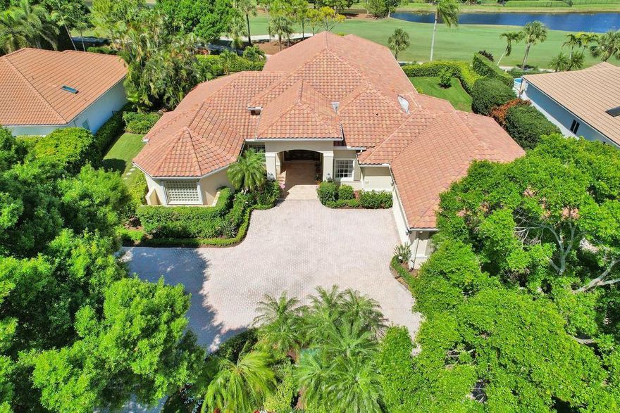 Luxury abounds in this 4 bedroom, 5.5 bath Admirals Cove residence.  Set on a 0.5 acre oversized double lot overlooking lush landscaping and the golf course, this custom single story home boasts an opulent open floor plan, custom cabinetry, office/den, large lanai with pool and spa, 2017 roof, full house generator, summer kitchen and more.  Nestled in the exclusive golf village community of 120 homes with 24/7 security, this property offers the ultimate in lavish living in Jupiter, Florida.  The Club at Admirals Cove offers world class amenities to include:  45 holes of Championship golf, full service Marina with 64 slips, full service spa and salon, 7 onsite dining options, fitness center and Tennis program,