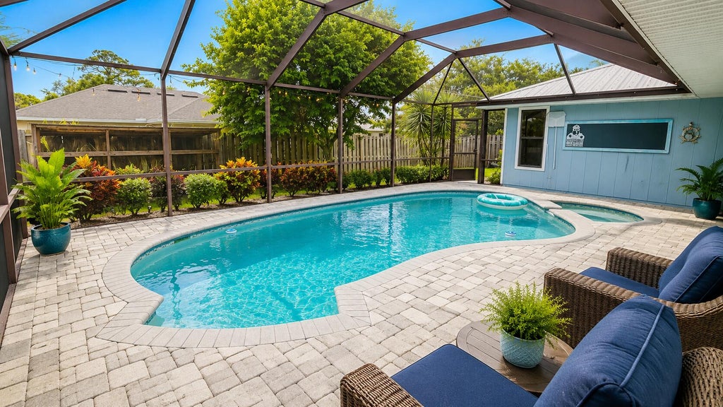 Photo of 757 SE LIGHTHOUSE Avenue, Port Saint Lucie, FL 34983 (MLS # B26065385)