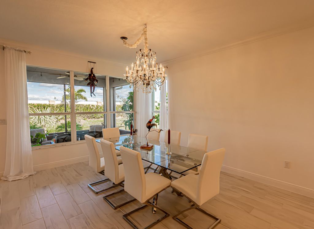 Photo of 10147 SW Coral Tree Circle, Port St Lucie, FL 34987 (MLS # R10871238)