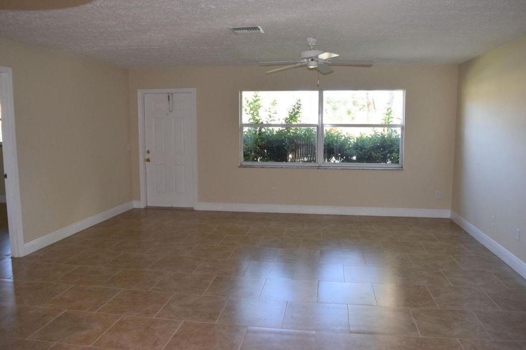 Photo of 1652 SE Floresta Drive, Port Saint Lucie, FL 34983 (MLS # B26022214)