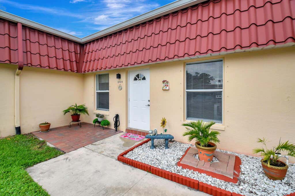 Photo of 860 Worcester Lane, Lake Worth, FL 33467 (MLS # R11113101)