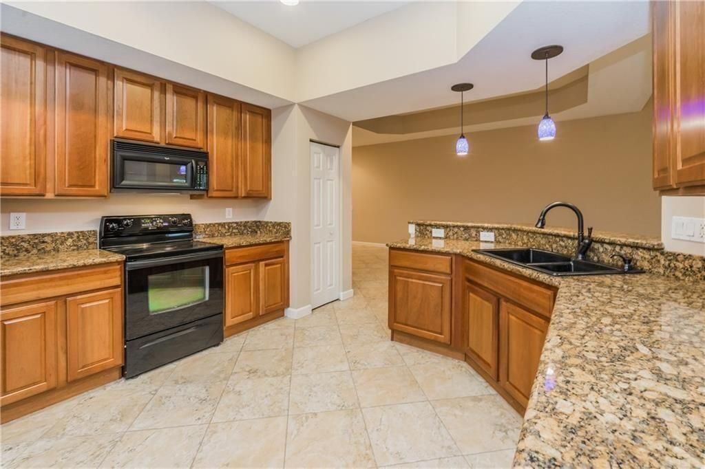 Photo of 3389 SW Sawgrass Villas Drive #12, Palm City, FL 34990 (MLS # R10966711)