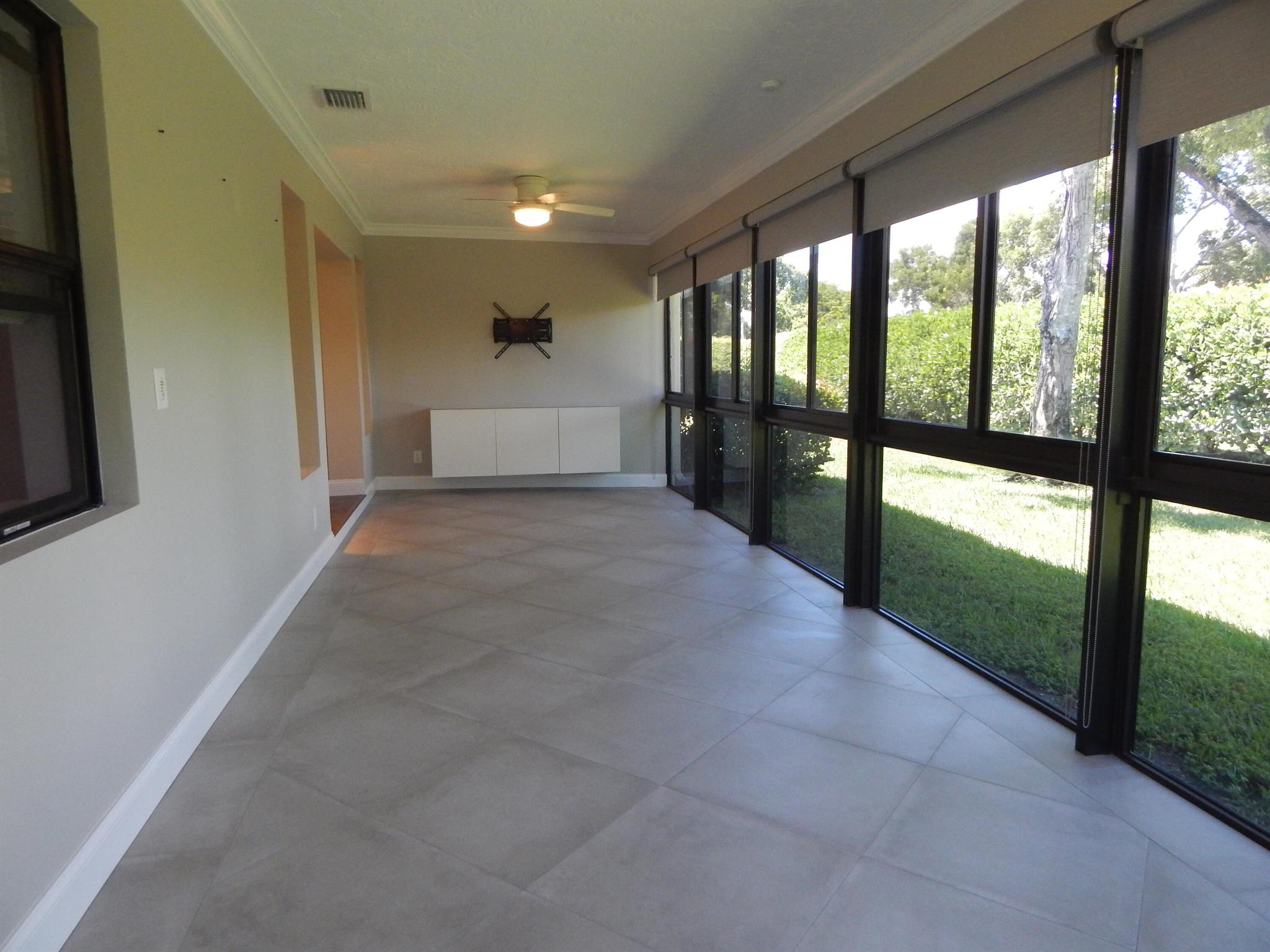 Breathtaking view of private rear yard from fully finished Full Glass Custom Lanai turned Family room Open to the rest of the Villa giving huge sense of space! Could also be use as a 4th bedroom! New Custom Guest bath, Custom Impact windows/garage throughout for lower HO Ins., Kosher Kitchen with many extras/smart home features, Appliances 5 yrs or younger, High Hats, Crown and Base Moldings, walk to Houses of Worship, Cathedral Ceilings with 2 Sky Lites, much more...too much to list! Just unpack and move right!