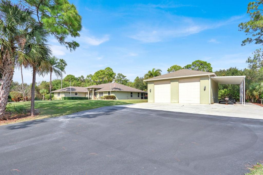 Photo of 15593 96th Lane N, The Acreage, FL 33412 (MLS # R11158846)