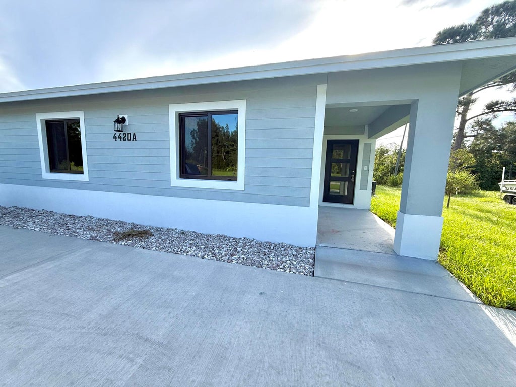 Photo of 4420 TIMBER RIDGE Lane #A, Fort Pierce, FL 34982 (MLS # B26074995)