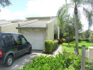 This townhome is perfect for someone willing to invest some TLC. End unit with garage and master bedroom on ground floor. Open floor plan with large tile flooring in living areas, skylights and vaulted ceilings.. Evidence of water damage was prior to roof being replaced by association. Third bedroom has a half wall overlooking the living area.