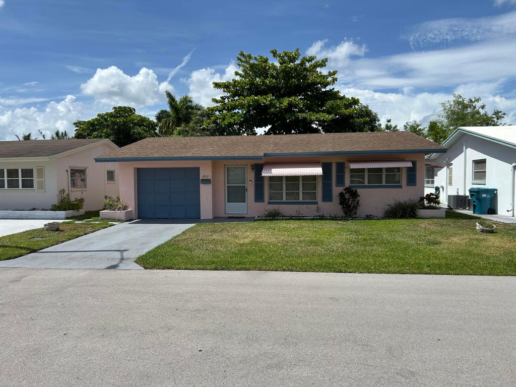 Photo of 4517 NW 49th Street, Tamarac, FL 33319 (MLS # B26035434)
