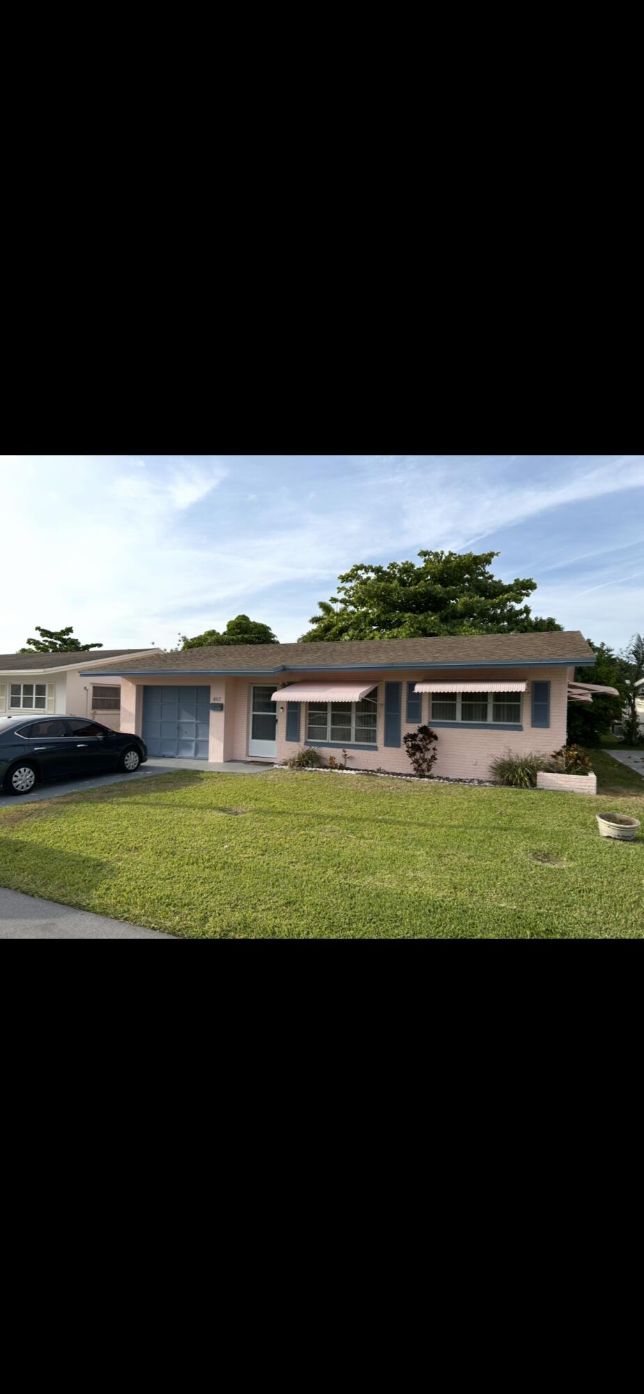 Photo of 4517 NW 49th Street, Tamarac, FL 33319 (MLS # B26035434)