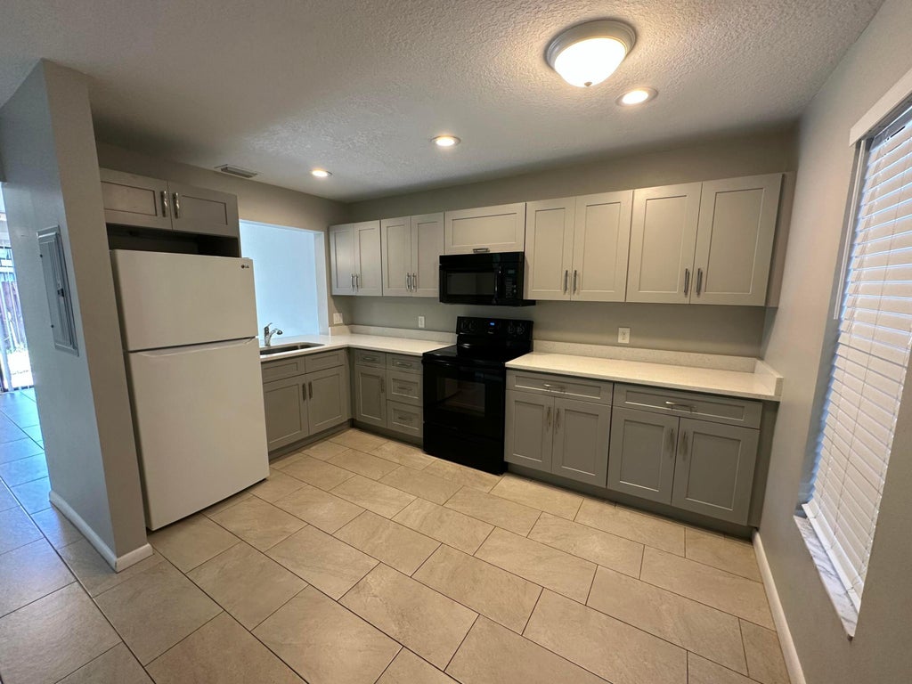 Photo of 5145 BRECKENRIDGE Place #35, West Palm Beach, FL 33417 (MLS # B26071673)