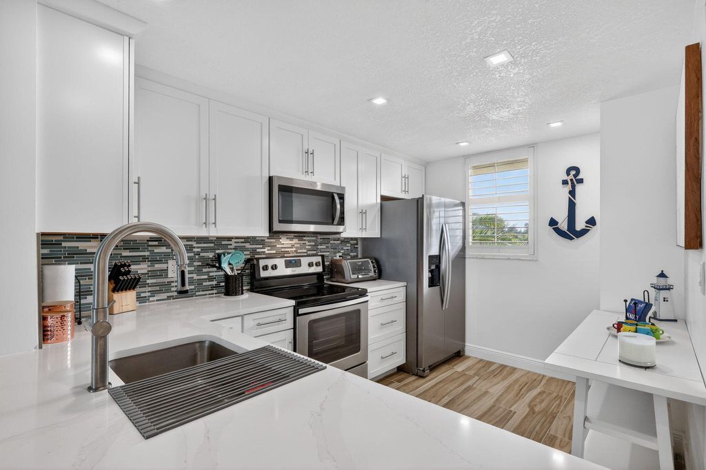 Photo of 9940 S Ocean Drive #202, Jensen Beach, FL 34957 (MLS # R11160964)