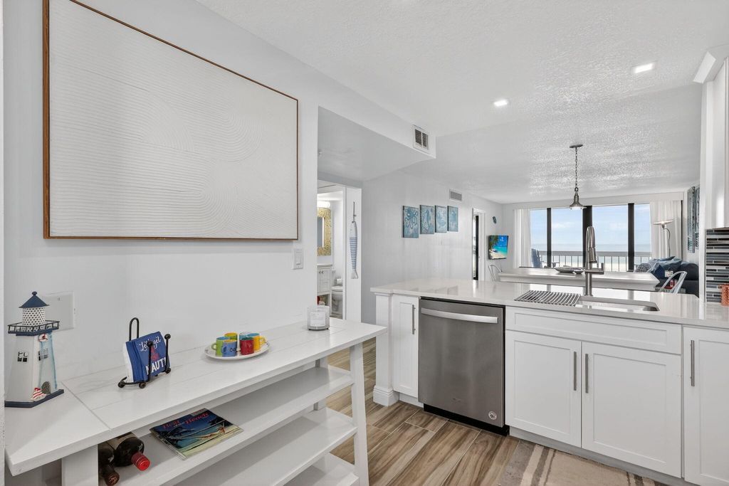 Photo of 9940 S Ocean Drive #202, Jensen Beach, FL 34957 (MLS # R11160964)