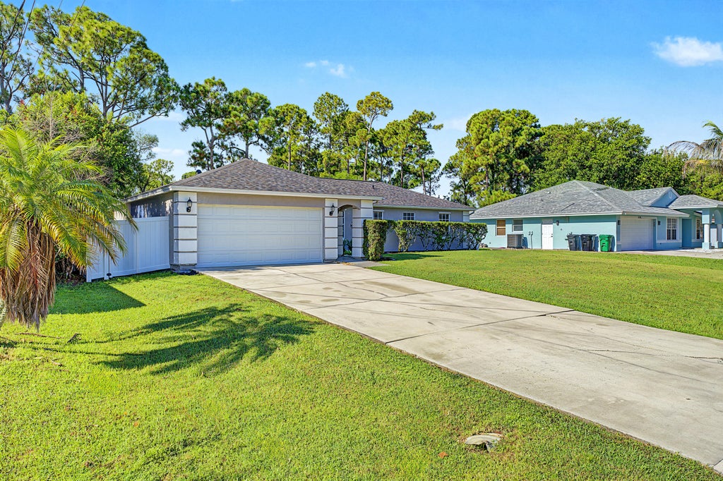 Photo of 1420 SW Melrose Avenue, Port Saint Lucie, FL 34953 (MLS # B26066872)