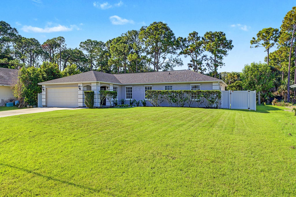 Photo of 1420 SW Melrose Avenue, Port Saint Lucie, FL 34953 (MLS # B26066872)
