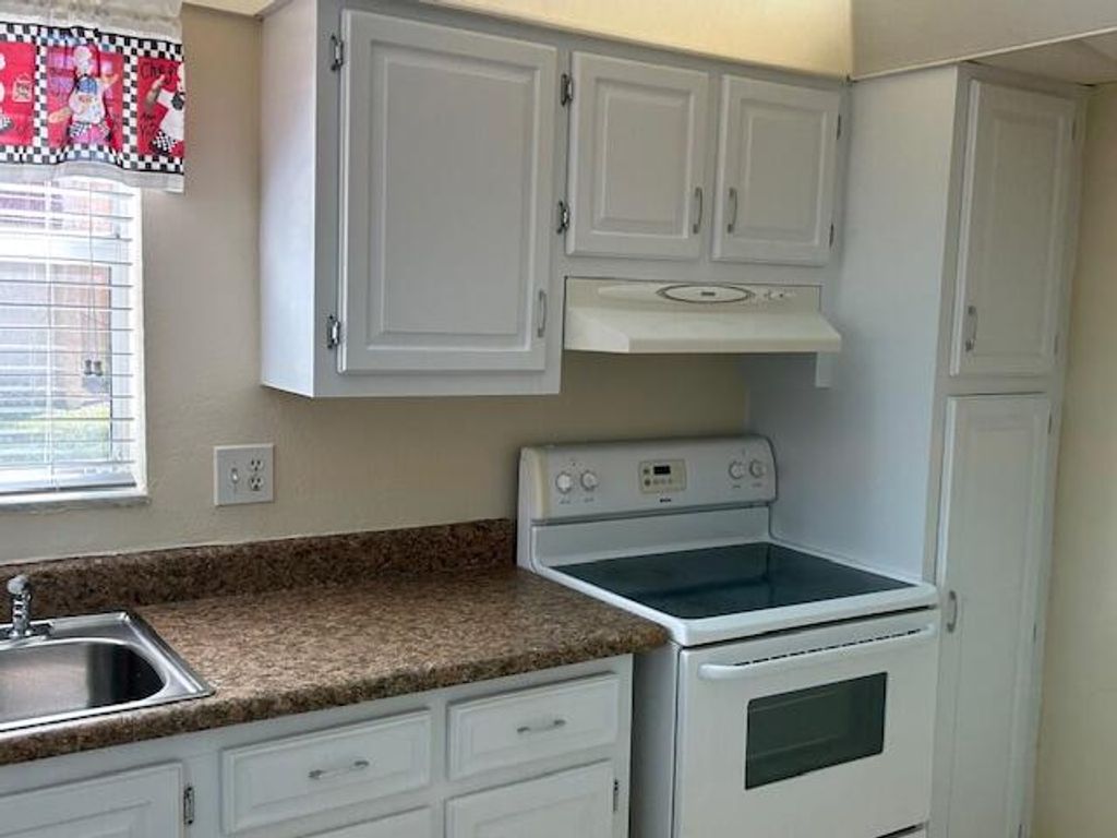 Photo of 145 Lake Evelyn Drive, West Palm Beach, FL 33411 (MLS # R11164853)