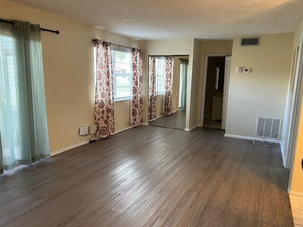 Photo of 145 Lake Evelyn Drive, West Palm Beach, FL 33411 (MLS # R11164853)