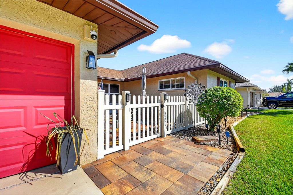 Photo of 10260 Greentrail Drive N, Boynton Beach, FL 33436 (MLS # R11165971)