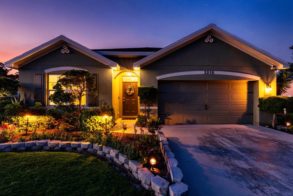 Photo of 3516 SW Pisano Street, Port Saint Lucie, FL 34953 (MLS # B26016908)