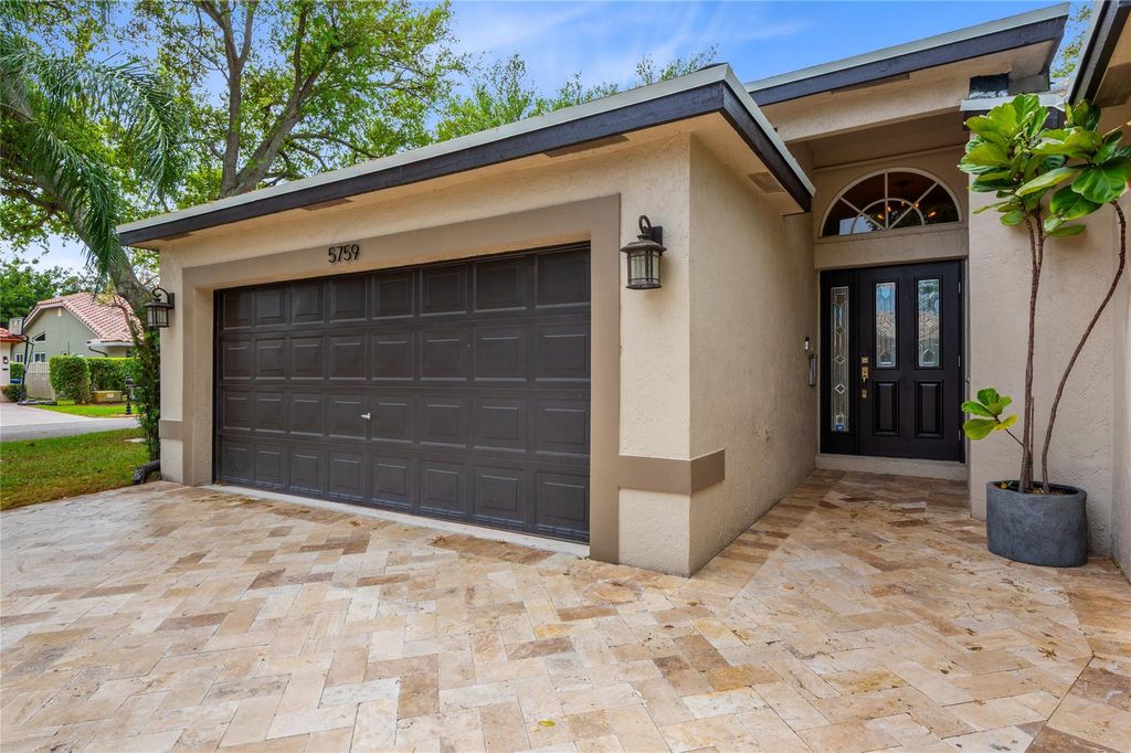 Photo of 5759 NW 48th Drive, Coral Springs, FL 33067 (MLS # F10491679)