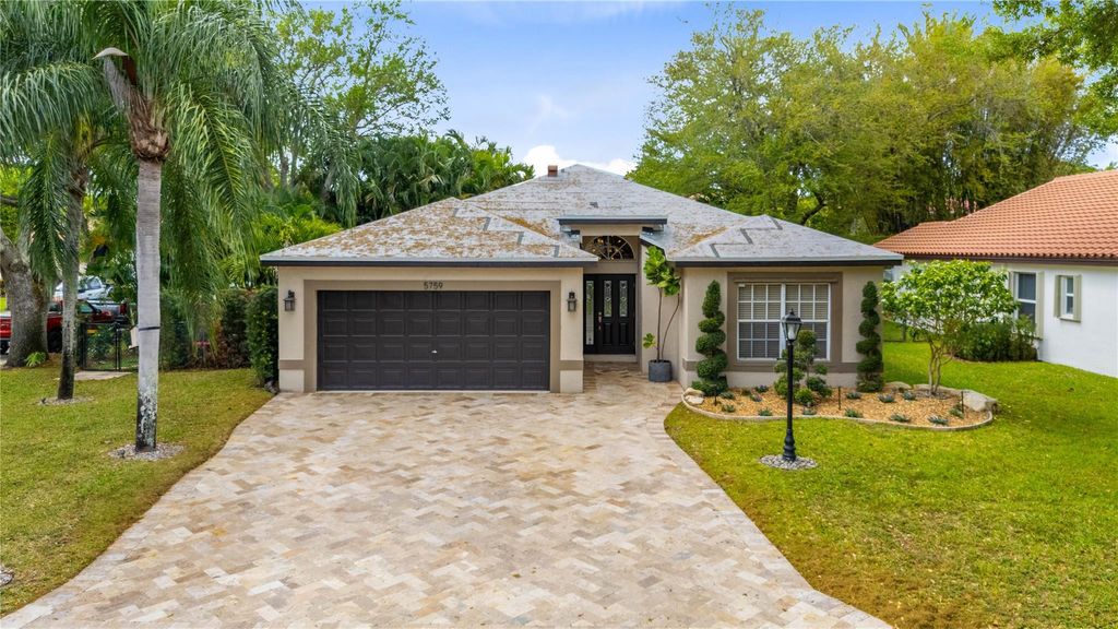 Photo of 5759 NW 48th Drive, Coral Springs, FL 33067 (MLS # F10491679)