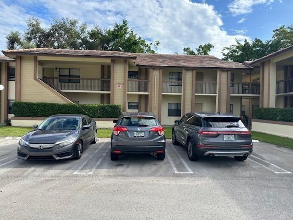 Photo of 11315 Royal Palm Boulevard #11315, Coral Springs, FL 33065 (MLS # F10523508)