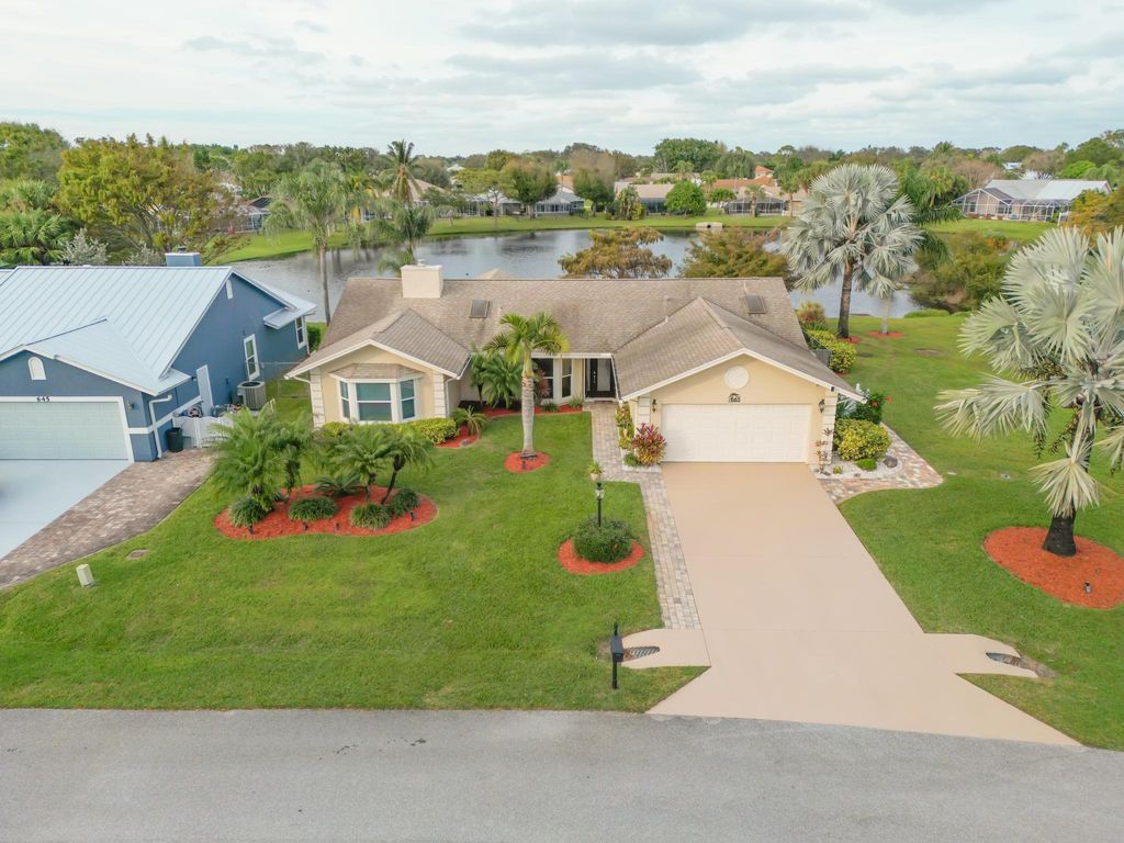 Photo of 665 NE Vanda Terrado, Jensen Beach, FL 34957 (MLS # R10943010)