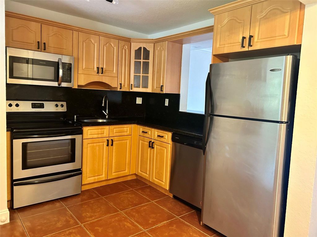 Photo of 6175 NW 57th Street #214, Tamarac, FL 33319 (MLS # F10525739)