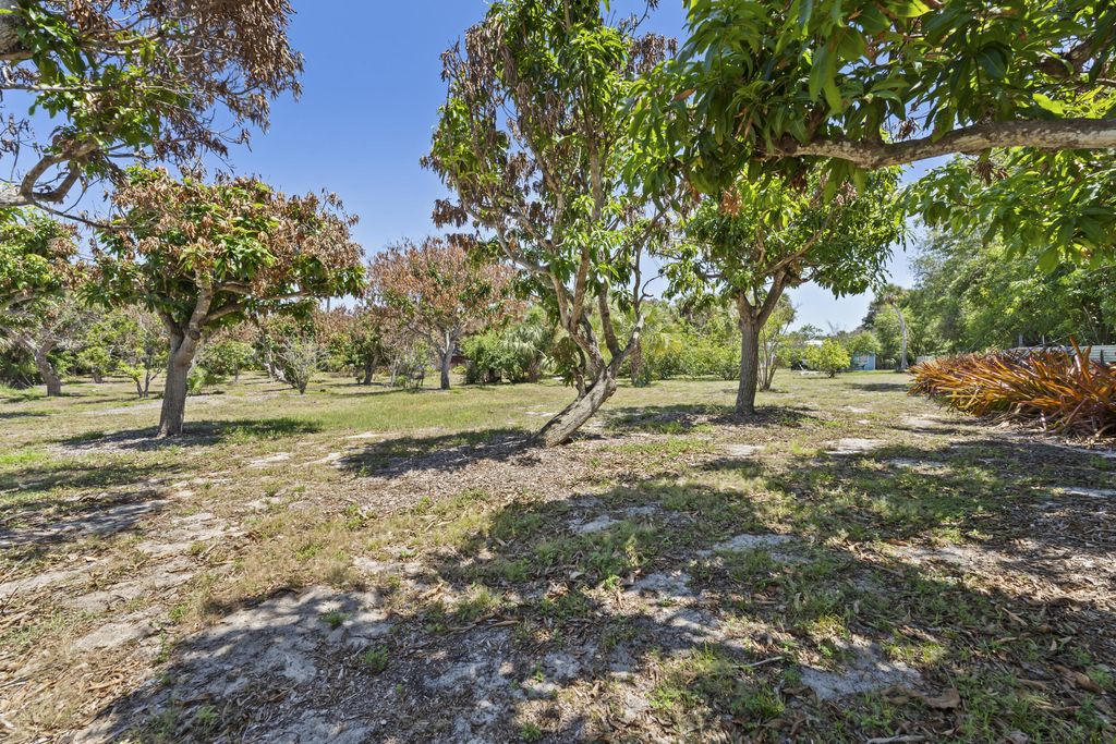 Photo of 2614 NE Palm Avenue, Jensen Beach, FL 34957 (MLS # B26022339)