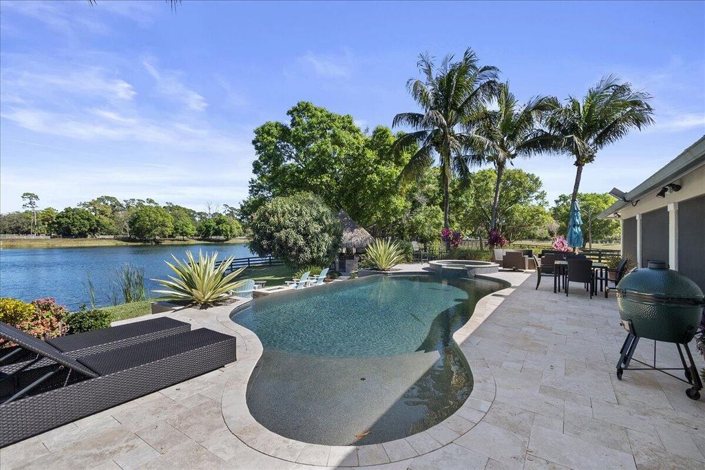 Photo of 10975 Randolph Siding Road, Jupiter, FL 33478 (MLS # R11160779)