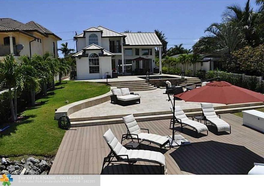 WILL CONSIDER SEASONAL RENTING CALL FOR PRICING. Great location and spectacular backyard with a daily boat show on the intercostal view. this completely remolded home offers 3 bedrooms each with their own private bath. Two king beds and one queen. this home is on the island side and three short blocks to popular Deerfield Beach.  Within walking distance to many restaurants and shopping. The dock has a 16000 lb boat lift and wave runner lift