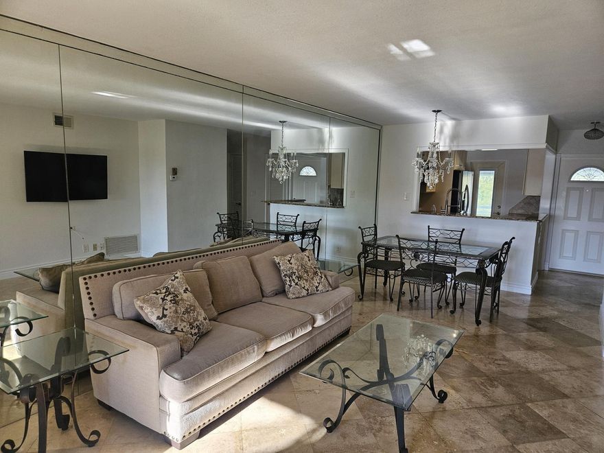 Third floor, 2 bedroom 2 bath unit. Updated kitchen and bathrooms. Kitchen has been opened up to the living area giving the unit a larger feel. Stainless steel appliances and granite counter tops. Travertine floors throughout the unit.