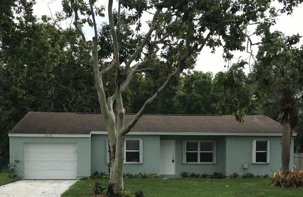 Photo of 2549 SE West Blackwell Drive, Port Saint Lucie, FL 34952 (MLS # R10958539)