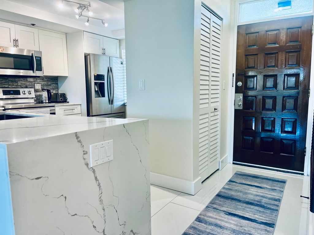 Photo of 3000 Presidential Way #306, West Palm Beach, FL 33401 (MLS # R11164380)