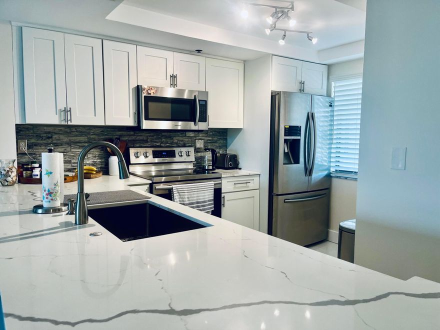 Welcome to your perfect short-term getaway at 300 Presidential Way, Unit 306, in beautiful West Palm Beach. This fully furnished, newly updated and modern 2-bedroom, 2-bath apartment is ideal for a seasonal stay or a summer retreat in Florida. Enjoy an expansive balcony, bright open living spaces, and a gourmet kitchen with stainless steel appliances. Guests will have access to a pool and assigned parking. Located just minutes from shopping, dining, and sunny beaches—your ideal Florida escape awaits!