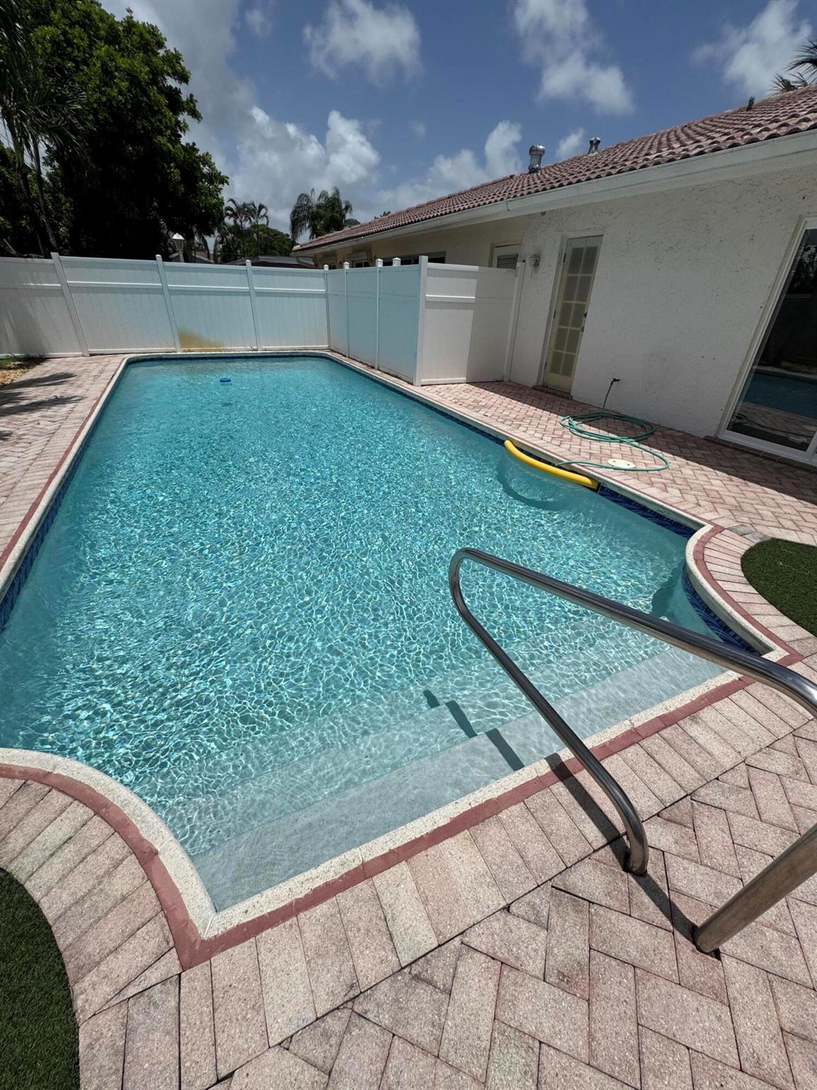 Spacious 2/2 Duplex in highly desirable Paradise Palms - Pool, Yard, and Plenty of Parking! This rare rental offers the perfect mix of comfort, convenience, and privacy with no HOA. The home features a generous open floor plan filled with natural light, along with a private backyard oasis that includes a large pool--perfect for relaxing or entertaining. The expansive yard offers plenty of space for outdoor activities. The property also boasts an oversized private driveway with room to comfortably park multiple cars, a boat, or other recreational vehicles. With no HOA, you have the freedom to truly make the space your own. Conveniently located just minutes from shopping, dining, parks, beaches and more!