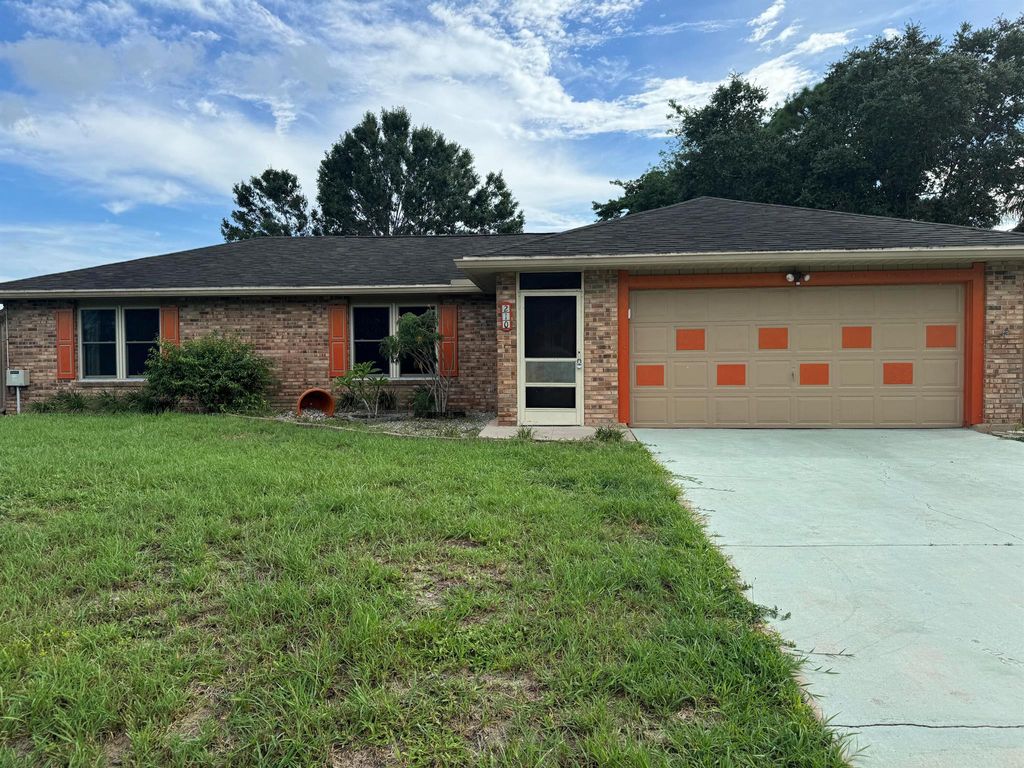 Photo of 210 SW Amesbury Avenue, Port Saint Lucie, FL 34953 (MLS # R11014190)