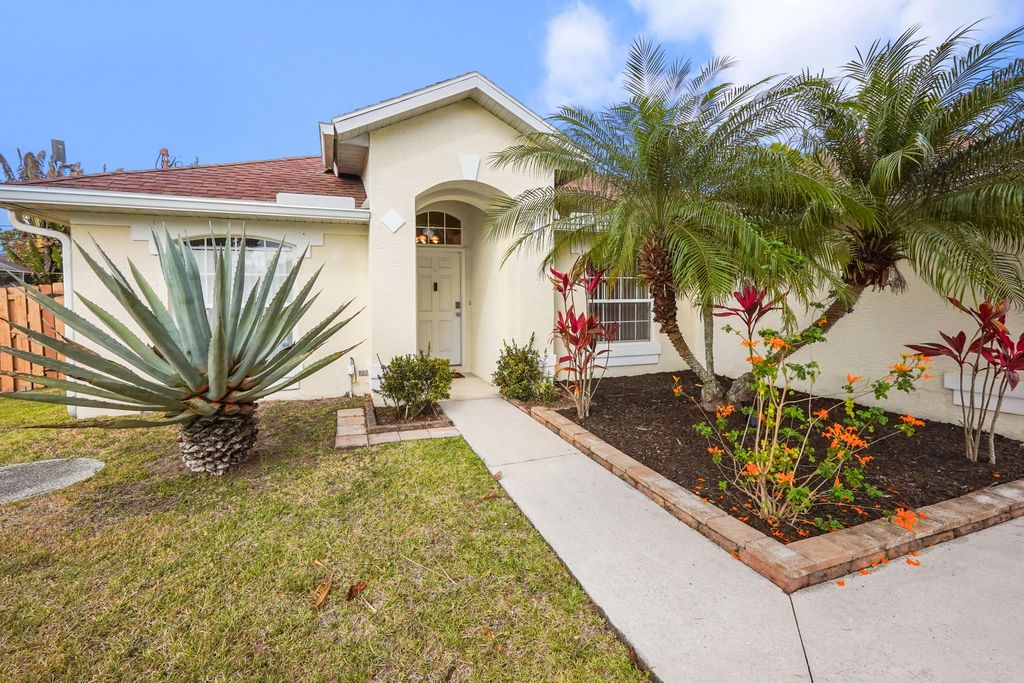 Photo of 1632 SW Rutland Street, Port Saint Lucie, FL 34987 (MLS # B26004455)