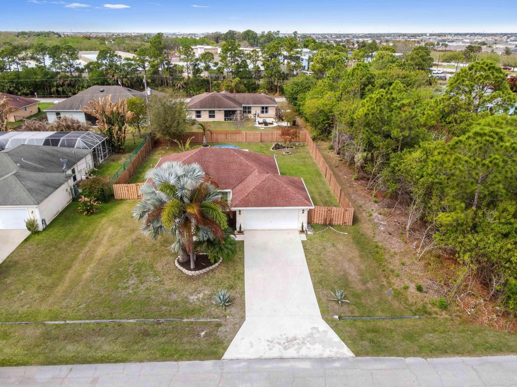 Photo of 1632 SW Rutland Street, Port Saint Lucie, FL 34987 (MLS # B26004455)