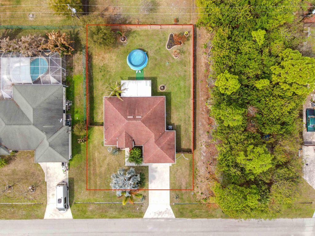 Photo of 1632 SW Rutland Street, Port Saint Lucie, FL 34987 (MLS # B26004455)
