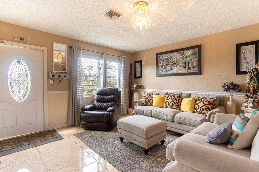 Photo of 561 SE 5th Street, Belle Glade, FL 33430 (MLS # R10928806)