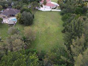 Rare opportunity to build your perfect home on this 1.05 acre waterfront lot located on a quiet cul-de-sac in the
Hills of Coral Springs.