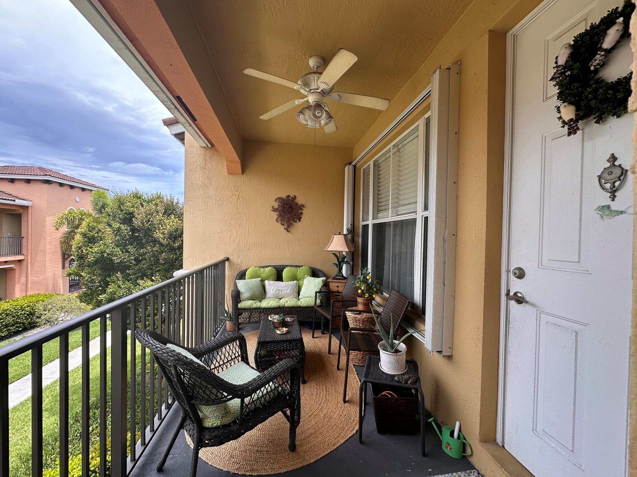 This second-floor unit offers a private, gated entrance on the first floor, which includes a convenient storage closet. A private staircase leads you to a North-facing balcony and the unit's main entrance. The home features a new water heater and a 2023 AC unit, ensuring modern comfort. While the unit needs some updating, it boasts a great layout with excellent potential. The community provides a private pool and a gym in the clubhouse, where onsite management is also available. LOW HOA fees!