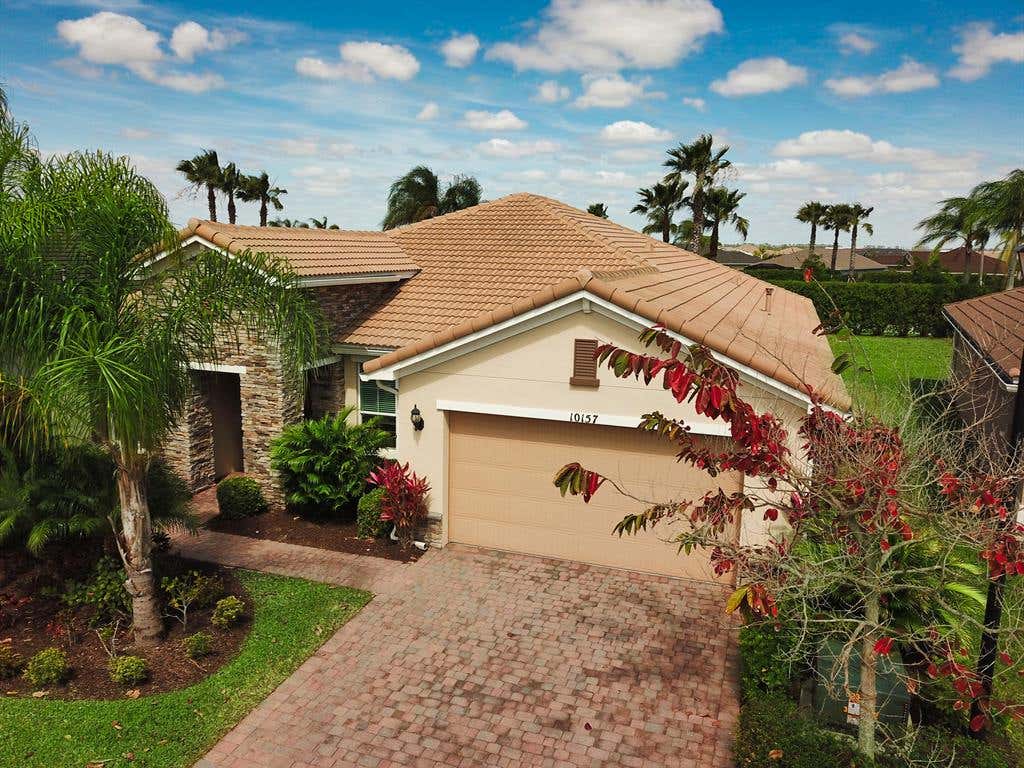 Photo of 10157 SW Cypress Wood Court, Port Saint Lucie, FL 34987 (MLS # R10700045)