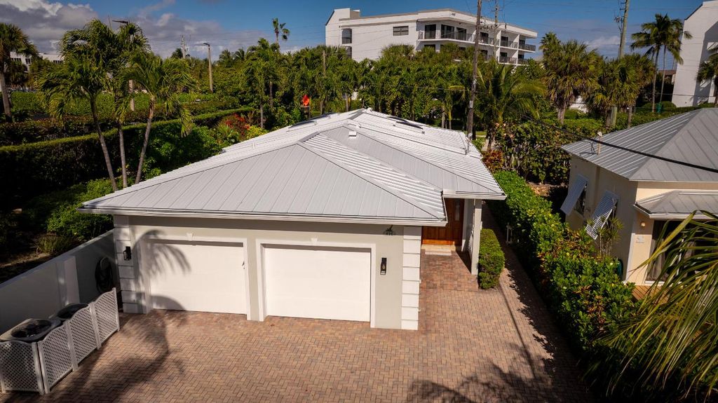 Photo of 495 Zephyr Way, Juno Beach, FL 33408 (MLS # R11158103)