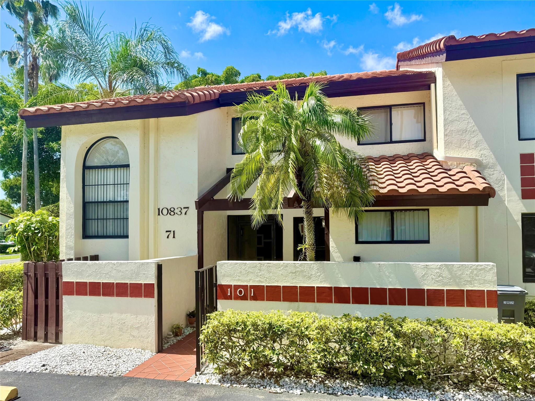 Beautiful 1st Floor 2-Bedroom, 2-Bathroom Condo + Den/Office in Palm Chase Condo. Hurricane-impact Windows + Accordion Shutters on Sliders. Lanai/Porch is Enclosed and adds extra living space. Large, Open and Bright Main Living/Dining Area! The Primary Suite offers a Large Walk-in Closet and an Additional Closet for Plenty of Storage. New LG Washer/Dryer and Updates Throughout. Two assigned Parking Spaces Just Out Front! Extra Storage and Courtyard at the Entrance. The Clubhouse features an Olympic Sized Temperature-Controlled Pool (Heated/Cooled), Hot Tub, Fitness Rooms, Card Rooms, Billiards, Tennis & Pickleball. HOA Includes Building Exterior/Roof, Insurance, Fiber-Optic Cable/Internet, Water, Garbage & More. Desirable 55+ Gated Community. ESA Animals Welcome!