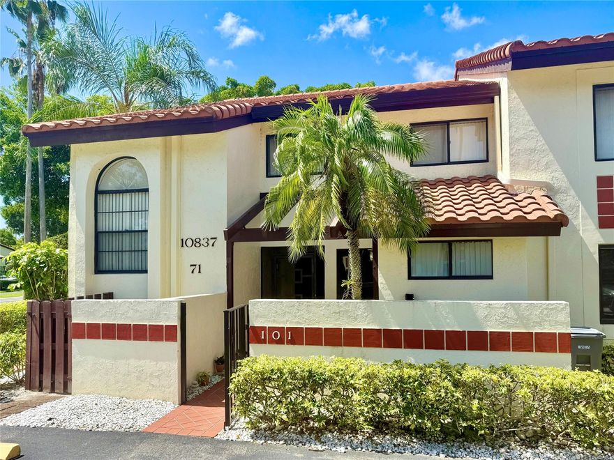 Beautiful 1st Floor 2-Bedroom, 2-Bathroom Condo + Den/Office in Palm Chase Condo.  Hurricane-impact Windows + Accordion Shutters on Sliders. Lanai/Porch is Enclosed and adds extra living space. Large, Open and Bright Main Living/Dining Area! The Primary Suite offers a Large Walk-in Closet and an Additional Closet for Plenty of Storage. New LG Washer/Dryer and Updates Throughout. Two assigned Parking Spaces Just Out Front! Extra Storage and Courtyard at the Entrance. The Clubhouse features an Olympic Sized Temperature-Controlled Pool (Heated/Cooled), Hot Tub, Fitness Rooms, Card Rooms, Billiards, Tennis & Pickleball. HOA Includes Building Exterior/Roof, Insurance, Fiber-Optic Cable/Internet, Water, Garbage & More. Desirable 55+ Gated Community. ESA Animals Welcome!