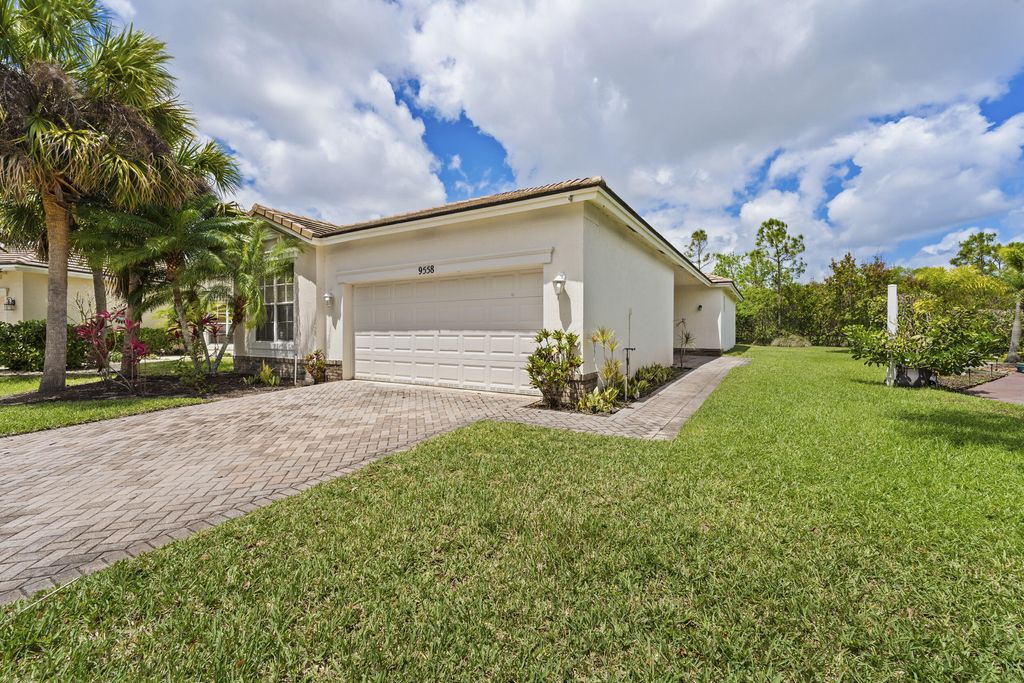 Photo of 9558 SW Flowermound Circle, Port Saint Lucie, FL 34987 (MLS # B26021582)