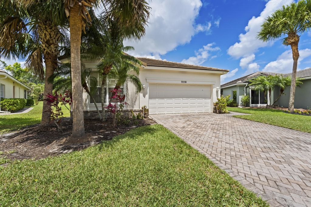 Photo of 9558 SW Flowermound Circle, Port Saint Lucie, FL 34987 (MLS # B26021582)