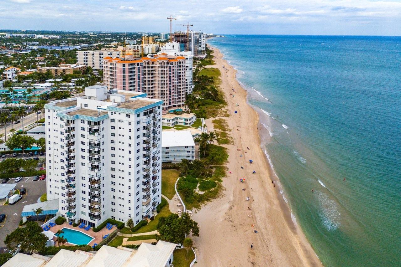 Discover ultimate luxury in this stunning oceanfront corner unit. This spectacular property offers the most incredible ocean view. This home is professionally decorated and completely furnished, currently configured as a spacious one-bedroom plus a convertible den/bedroom, with 2 full renovated bathrooms. Is just a beach lover's dream come true. Nestled along the pristine shores, this property offers breathtaking panoramic views of the ocean and direct access to the sandy beaches just steps away from your front door. Enjoy the soothing sounds of the waves from your balcony and deeded beach access.. Enjoy the convenience of in-unit laundry with the BRAND new LG washer/dryer. ***AVAILABLE ONLY FOR SEASONAL LEASE JUNE-OCTOBER 2025 . MINIMUM 3 MONTHS.