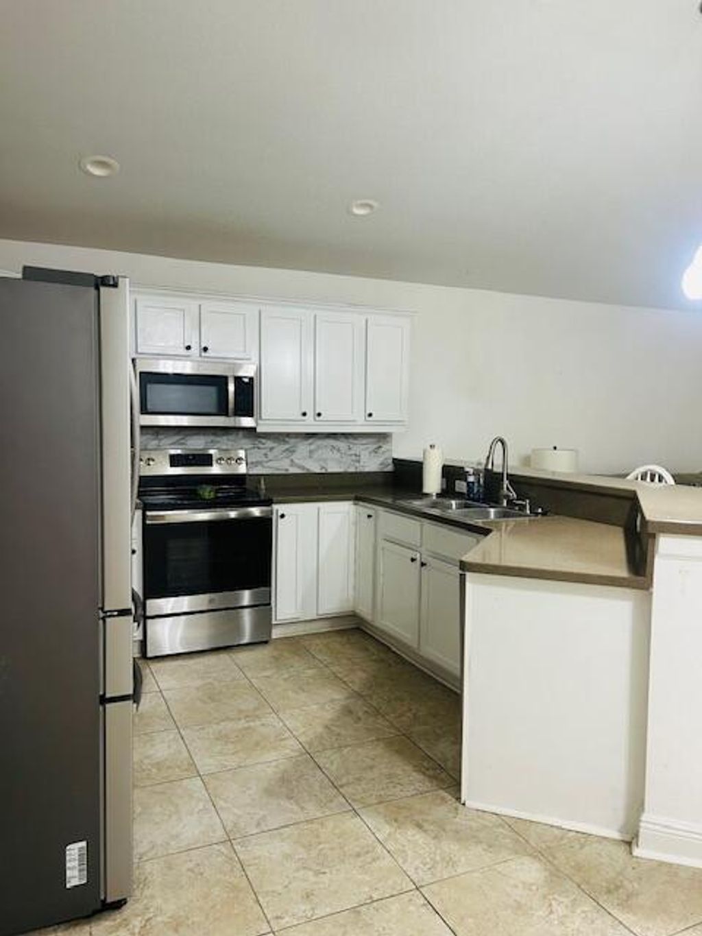 Photo of 5946 SE Inez Avenue, Stuart, FL 34997 (MLS # R11146889)